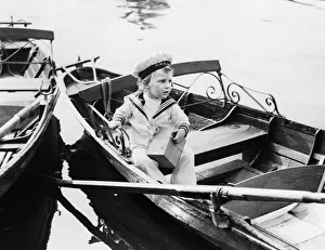 01249 Prints: Waiting for his boat to go out, John Woodward of Fulham complete in naval rig-out