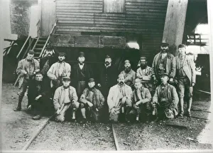 Waiting for the cage. Miners about to start their shift at Lambton Colliery. Circa 1920