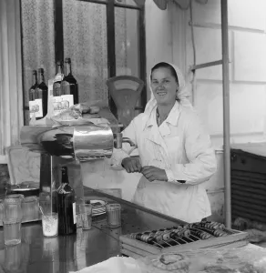 Canteen Prints: A waitress stands behind the counter ready to serve in a russian tea shop in Yalta