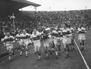 Wakefield Trinity do a lap of honour during the Rugby League Cup Final after beating