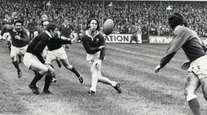 WALES V SCOTLAND 1976- PICTURE SHOWS: Man-of-the-series J. P. R. Williams passes out to J