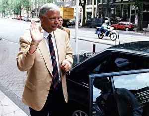 Wallace Mercer Hearts football chief leaves Amsterdam for the South of France waving hand