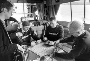 00081 Prints: Walter Bellfield, second left, and Leo Casey, right, paly their final on board the Marly