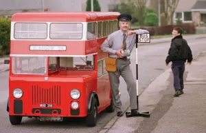 Motors Prints: Walter Colvin pictured with the mini bus he built over a three year period April 1998