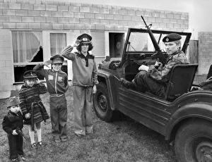 00030 Prints: War relic enthusiast mum Monica leads the White army on parade for dads inspection