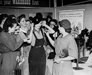 War workers in a London factory organise a make do and mend centre