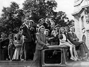 00180 Prints: War - World War II - Yound people in Cardiff climb on board a lorry to use it as a