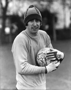 Warming to the task, Chelsea goal-keeper Peter Bonetti who faces Manchester United