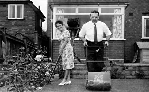 00445 Prints: Warwickshire County Cricket Club secretary Leslie Deakins with his wife Norah working in