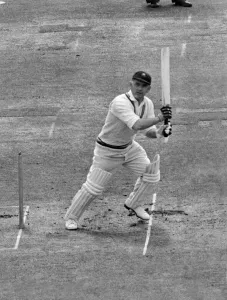Washbrook makes a lovely drive off A. V. Bedser. May 1953 P009607