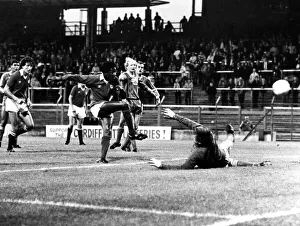 00383 Prints: ) watches as Dave Bennett scores against Hereford goalkeeper John Jackson. Aug 1982