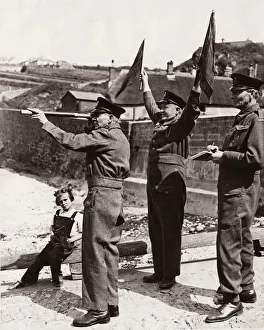 Their ever watchful eyes scan the sea and signals are sent to ships by means of semaphore