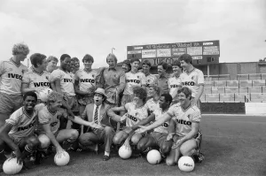 Watford FC chairman Elton John with Watford football team at a photocall