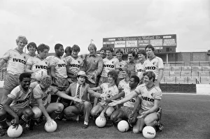 Watford FC chairman Elton John with Watford football team at a photocall