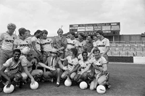 Watford FC chairman Elton John with Watford football team at a photocall