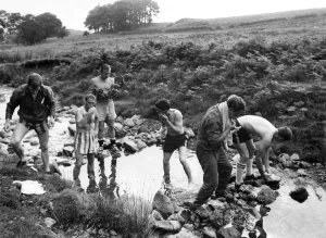 Watford in training in the Lake District. Some of the team bathing in a stream near