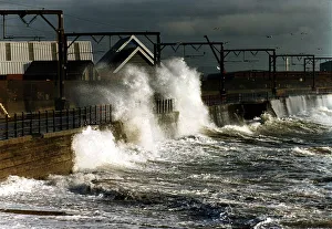 Waves Prints: Waves crash against a wall at Solcots after heavy winds caused the sea to become rough