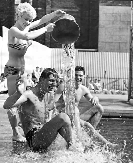 Blonde Prints: One way to cool off in the present heat wave is to have a bucket of cold water thrown