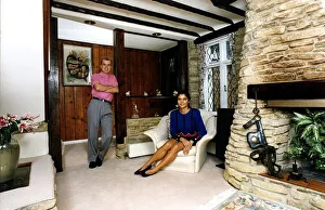 Wayne Dobson Magician with Karen Dobson in cottage living room Dbase A&copy;Mirrorpix