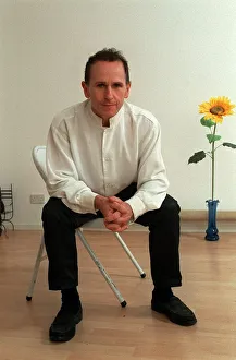 Wayne Sleep / Dancer / Actor September 98 At home relaxing sitting on chair