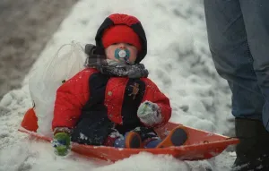 Weather in Aberdeen 9th February 1999 A toddler in Aberdeen shows how to enjoy