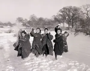 Weather Winter Scenes January 1960 Philippine dancers have a snowball fight