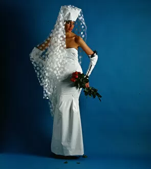Images Dated 15th June 1986: Wedding dress and fashion, June 1986 Model wearing PVC strapless dress