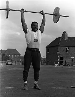 Lifting Prints: Weightlifter Louis Martin training in Rawdon Street where he lives in Derby