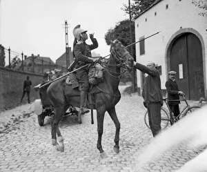 Brass Helmet Prints: A welcome drink for a thirsty French Dragoon Scout in Belgium reconnoitering near