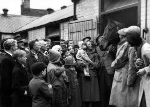 Welcome Home! This was the welcome awaiting Grand National winner, Oxo