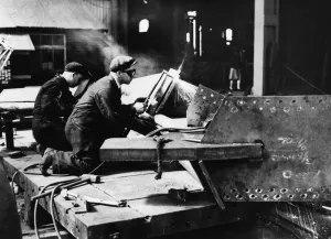 Factories Prints: Welders in Tipton Docklands working on a section of fabricated steel sheet frame