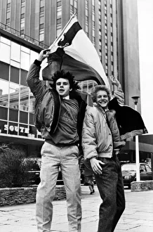 Welsh rock band Ceffyl Pren members Alun Wyn Davies and Jon Evvo fly the Welsh flag as