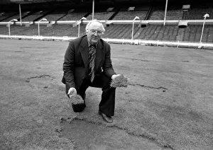 Wembley groundsman Don Gallacher inspects the damage cause by the Scottish fans following