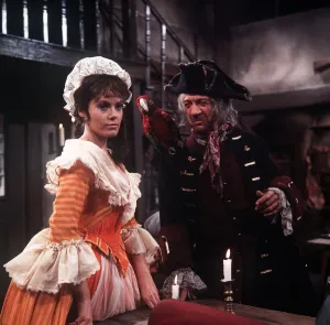 Wendy Richard actress and Sid James comedy actor in the film Carry on Christmas