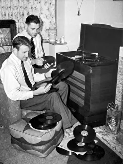 Record Player Prints: West Bromwich Albion footballer Ray Barlow at home playing records