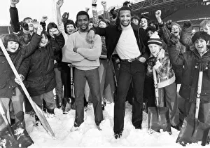 Shovel Prints: West Bromwich Albion footballers Laurie Cunningham and Cyrille Regis with West Brom fans