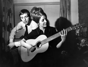West Bromwich Albions Jeff Astle sings as his wife Laraine plays the guitar at their