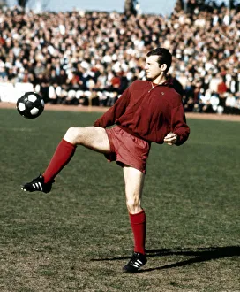 Skills Prints: West Germany footballer Franz Beckenbauer practices his ball control before a match