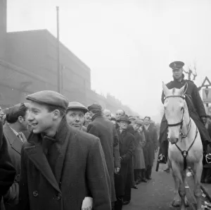 West Ham fans queue at Upton Park as tickets for their FA Cup match against Fulham go