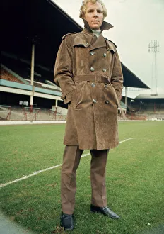West Ham United footballer Bobby Moore modelling a coat at Upton park February