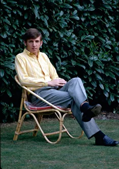 West Ham United footballer Martin Peters relaxes sitting on a deckchair October