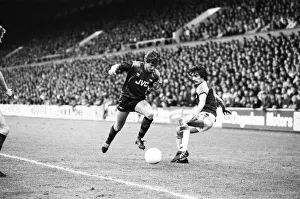 West Ham v. Arsenal. Kenny Samson goes past Alan Devonshire 10th May 1983