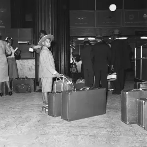 01423 Prints: One hundred and two West Indians seen here arriving at Heathrow Airport from Kingston