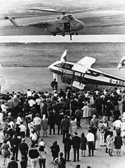 A Whirlwind helicopter from R. A. F. Chivenor wishes a man up during a search