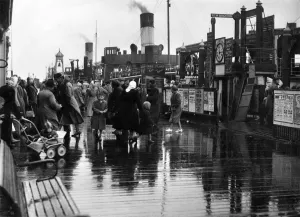 00049 Prints: White holidays Liverpool. The ferry boat passengers at Liverpool Landing Stage did not