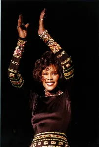 Whitney Houston Singer and Actress who starred in the film Bodyguard at her concert in