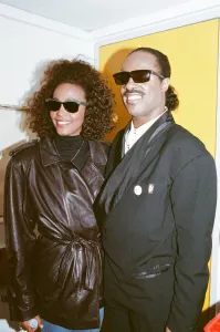 Backstage Prints: Whitney Houston and Stevie Wonder smile for a photograph backstage at the Nelson Mandela