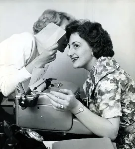 Secretary Prints: Wicked whispers, November 1960 Girls gossiping in the office