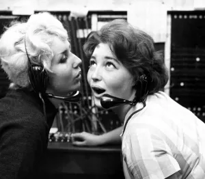 Secretary Prints: Wicked whispers, September 1960 Girls gossiping in the office Wearing