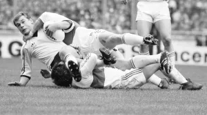 00351 Prints: A Widnes player is brought down by a high tackle during the Rugby League Cup Final
